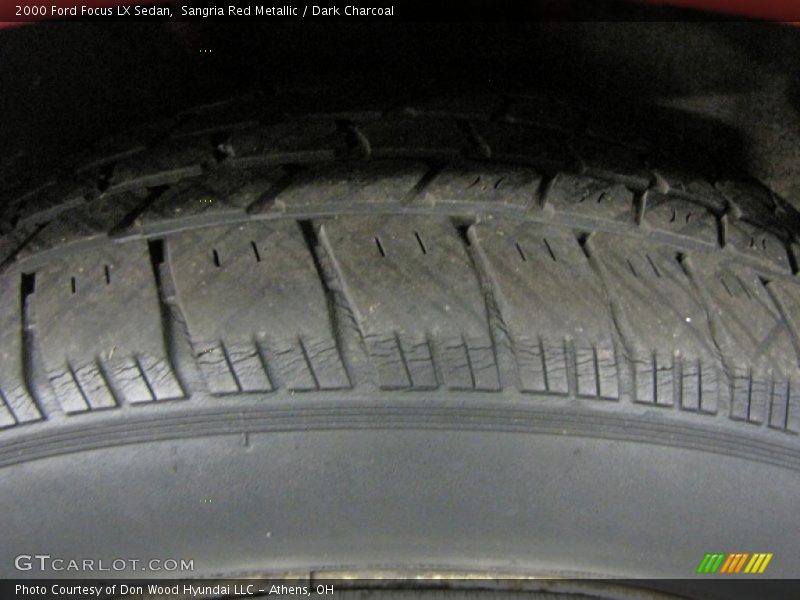 Sangria Red Metallic / Dark Charcoal 2000 Ford Focus LX Sedan
