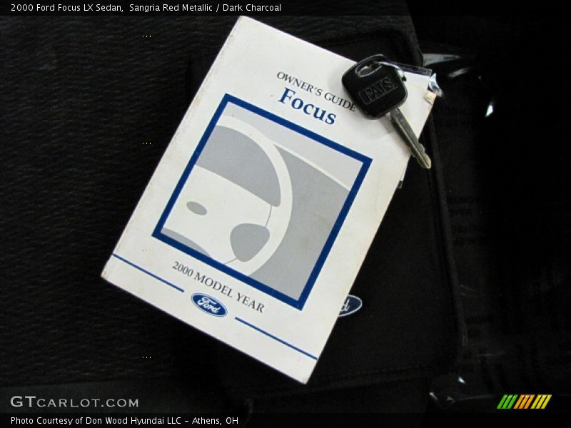 Sangria Red Metallic / Dark Charcoal 2000 Ford Focus LX Sedan