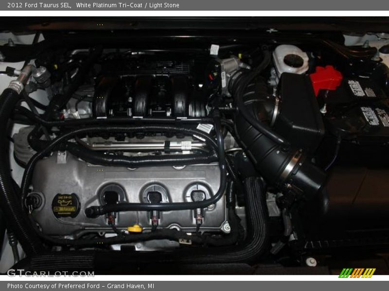White Platinum Tri-Coat / Light Stone 2012 Ford Taurus SEL