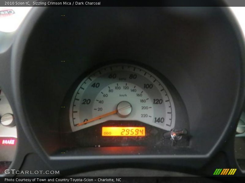 Sizzling Crimson Mica / Dark Charcoal 2010 Scion tC
