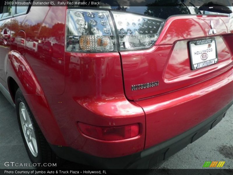 Rally Red Metallic / Black 2009 Mitsubishi Outlander ES