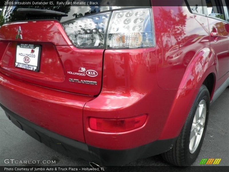 Rally Red Metallic / Black 2009 Mitsubishi Outlander ES