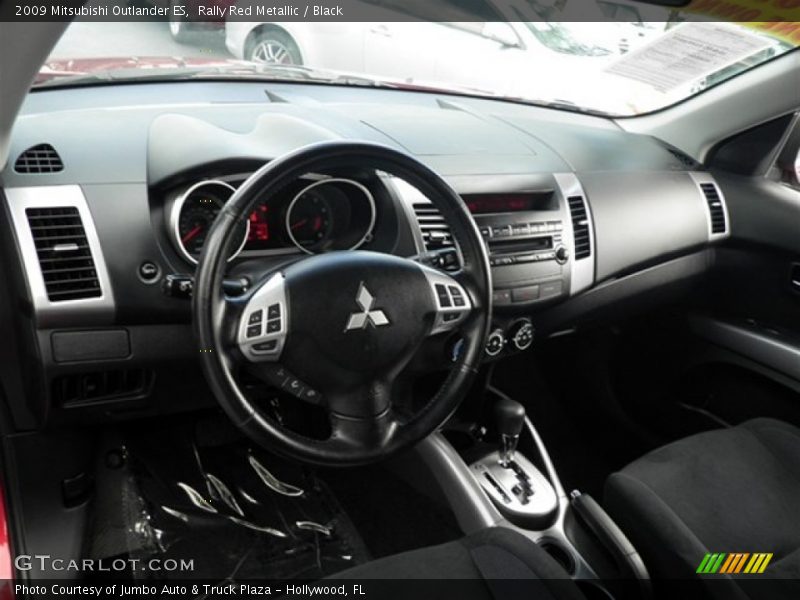 Rally Red Metallic / Black 2009 Mitsubishi Outlander ES