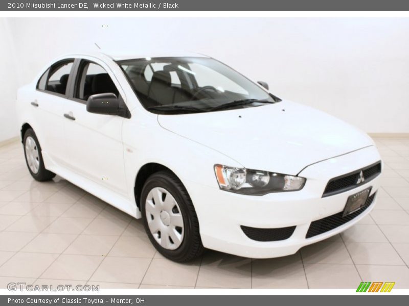 Wicked White Metallic / Black 2010 Mitsubishi Lancer DE