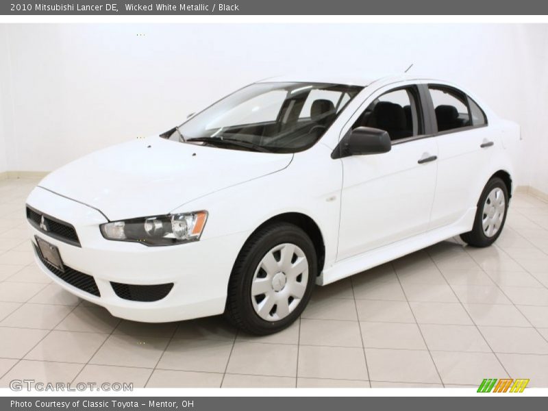 Wicked White Metallic / Black 2010 Mitsubishi Lancer DE