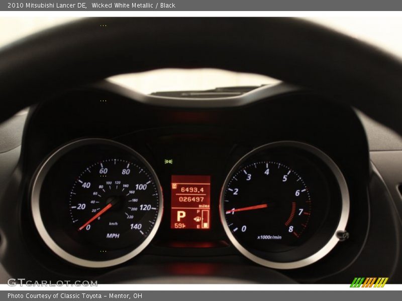 Wicked White Metallic / Black 2010 Mitsubishi Lancer DE