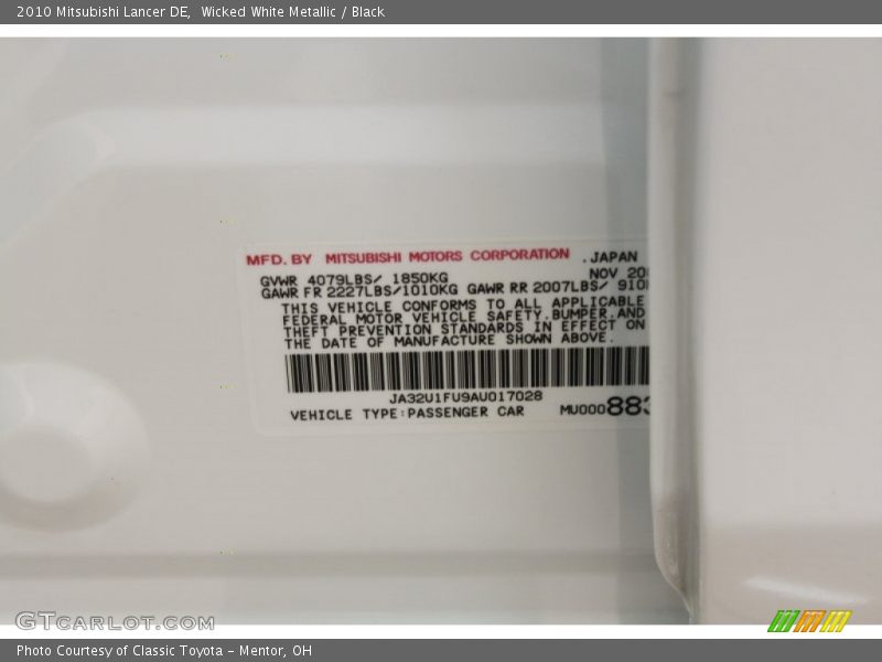 Wicked White Metallic / Black 2010 Mitsubishi Lancer DE