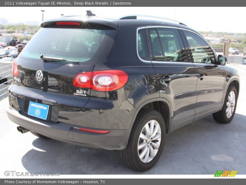 Deep Black Metallic / Sandstone 2011 Volkswagen Tiguan SE 4Motion
