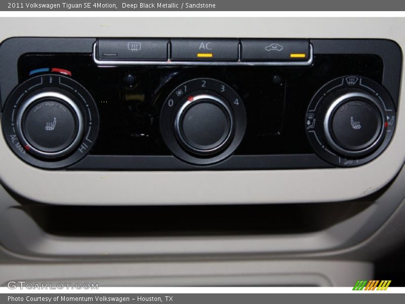 Deep Black Metallic / Sandstone 2011 Volkswagen Tiguan SE 4Motion