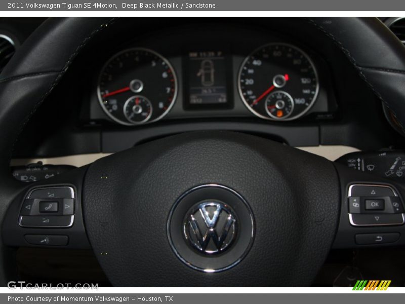 Deep Black Metallic / Sandstone 2011 Volkswagen Tiguan SE 4Motion