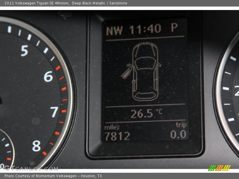 Deep Black Metallic / Sandstone 2011 Volkswagen Tiguan SE 4Motion