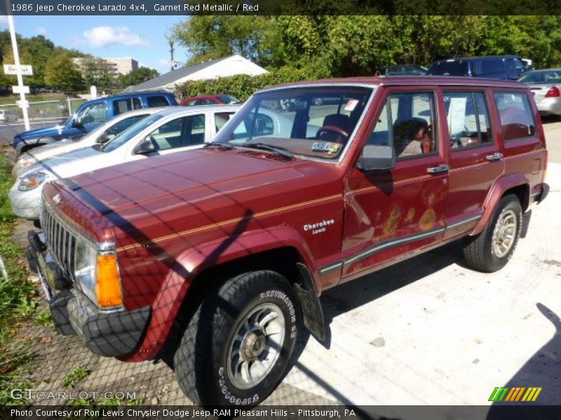 Garnet Red Metallic / Red 1986 Jeep Cherokee Larado 4x4