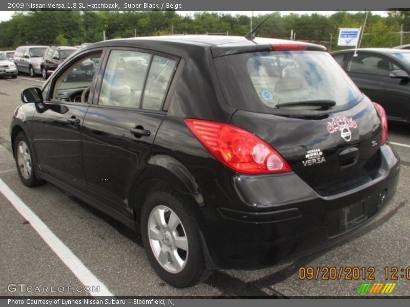 Super Black / Beige 2009 Nissan Versa 1.8 SL Hatchback