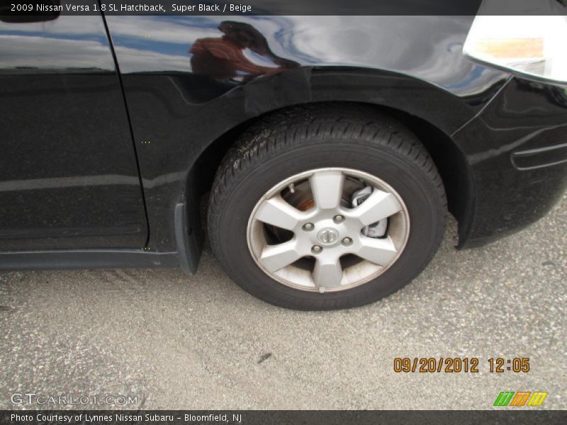 Super Black / Beige 2009 Nissan Versa 1.8 SL Hatchback