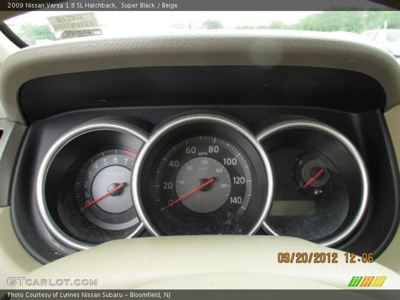 Super Black / Beige 2009 Nissan Versa 1.8 SL Hatchback