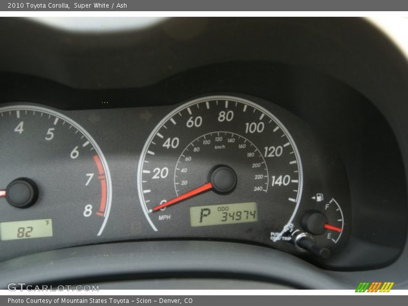Super White / Ash 2010 Toyota Corolla