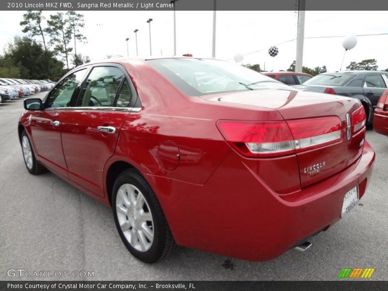 Sangria Red Metallic / Light Camel 2010 Lincoln MKZ FWD