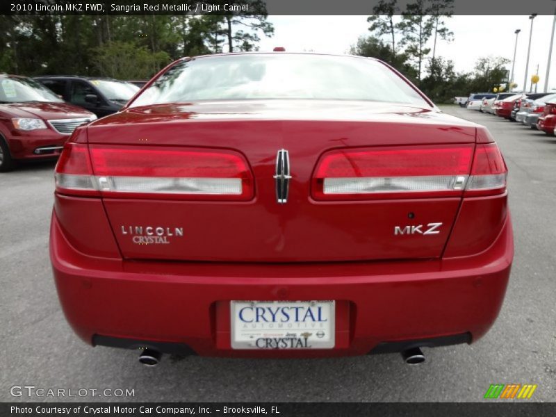 Sangria Red Metallic / Light Camel 2010 Lincoln MKZ FWD