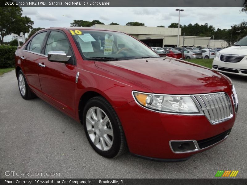 Sangria Red Metallic / Light Camel 2010 Lincoln MKZ FWD