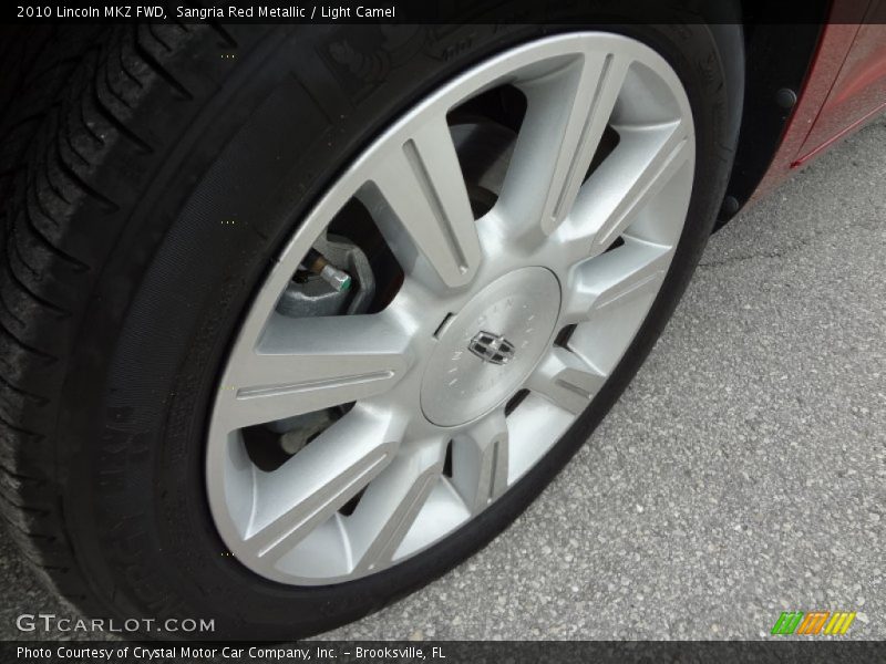 Sangria Red Metallic / Light Camel 2010 Lincoln MKZ FWD