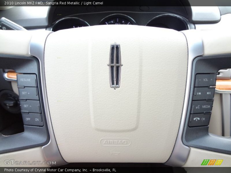 Sangria Red Metallic / Light Camel 2010 Lincoln MKZ FWD