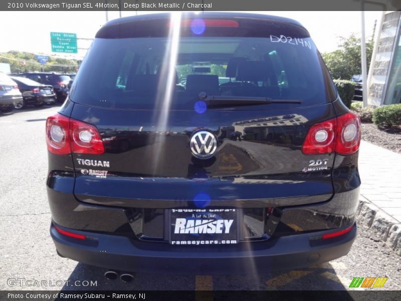 Deep Black Metallic / Charcoal 2010 Volkswagen Tiguan SEL 4Motion