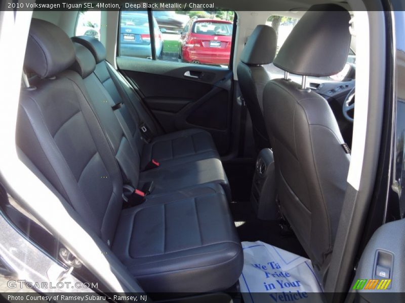 Deep Black Metallic / Charcoal 2010 Volkswagen Tiguan SEL 4Motion
