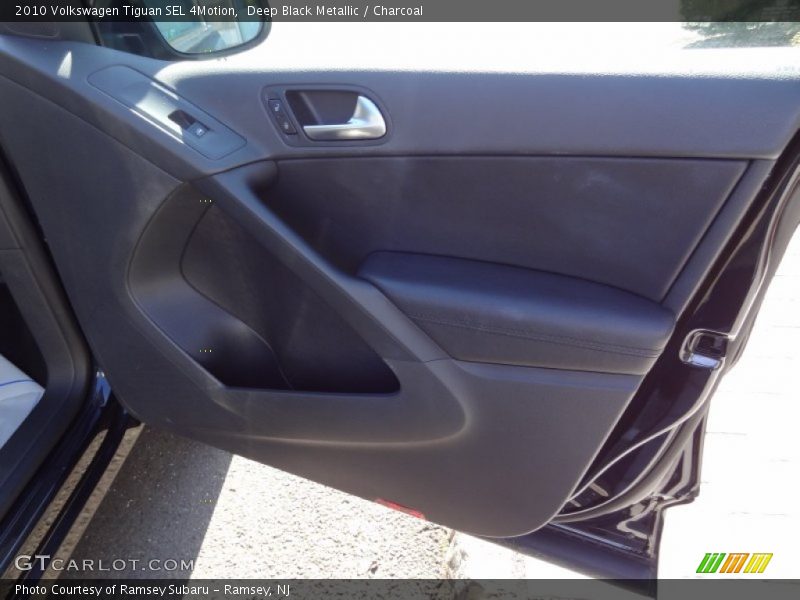 Deep Black Metallic / Charcoal 2010 Volkswagen Tiguan SEL 4Motion