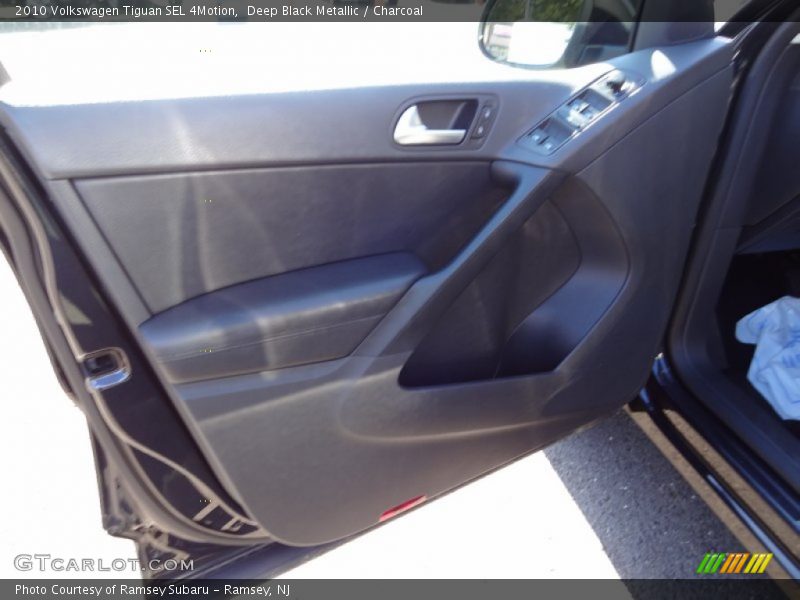 Deep Black Metallic / Charcoal 2010 Volkswagen Tiguan SEL 4Motion