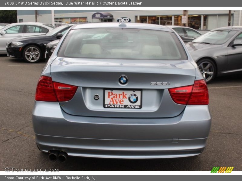 Blue Water Metallic / Oyster Dakota Leather 2009 BMW 3 Series 328xi Sedan