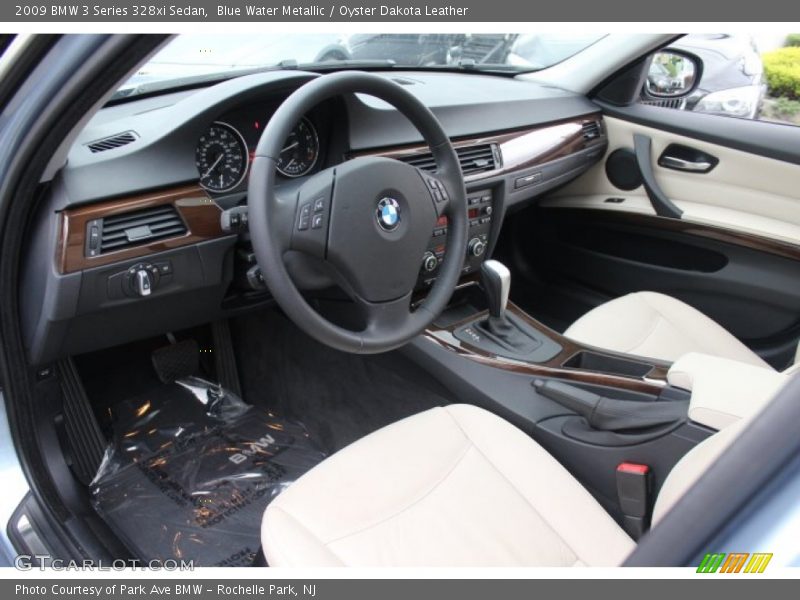 Blue Water Metallic / Oyster Dakota Leather 2009 BMW 3 Series 328xi Sedan