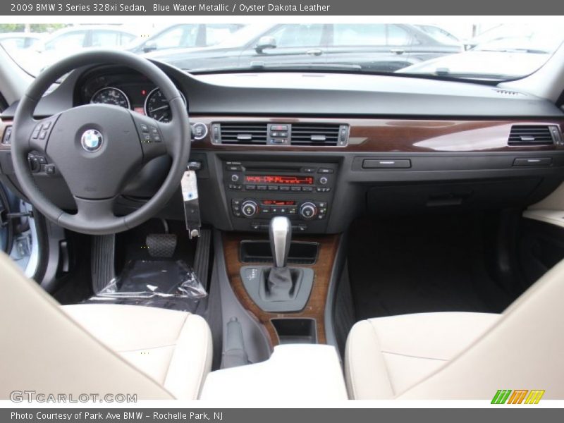 Blue Water Metallic / Oyster Dakota Leather 2009 BMW 3 Series 328xi Sedan