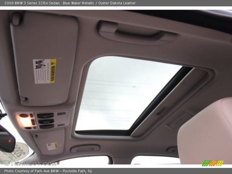 Blue Water Metallic / Oyster Dakota Leather 2009 BMW 3 Series 328xi Sedan