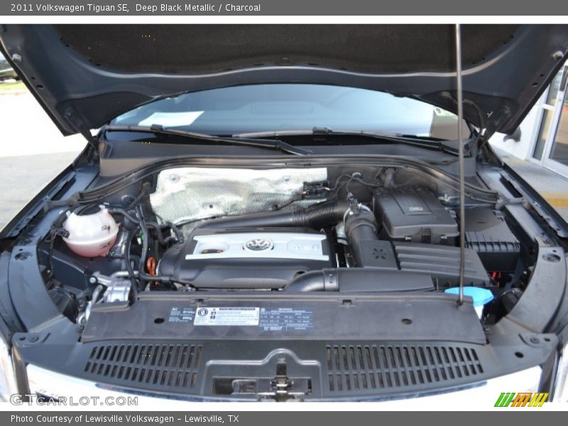 Deep Black Metallic / Charcoal 2011 Volkswagen Tiguan SE