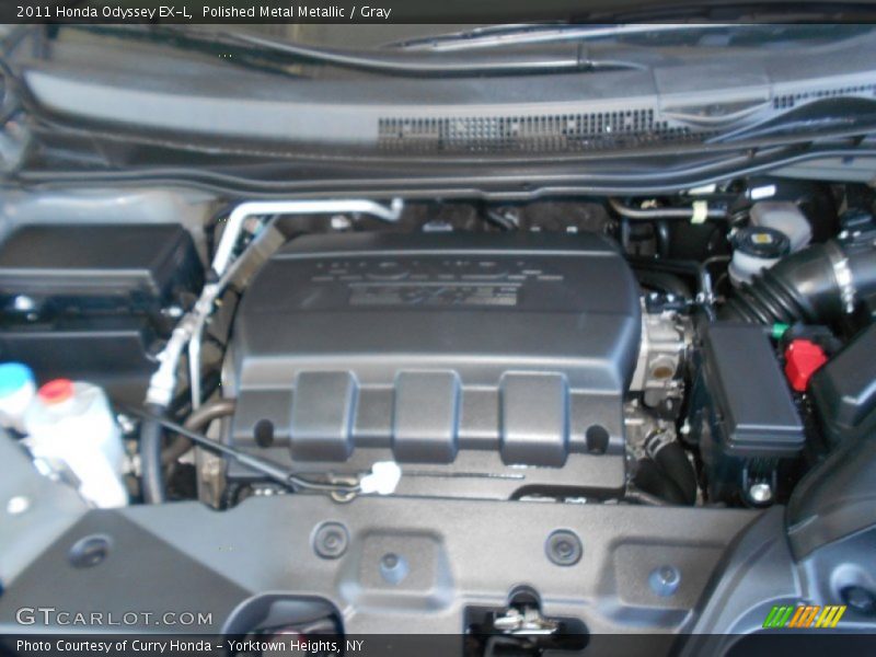 Polished Metal Metallic / Gray 2011 Honda Odyssey EX-L