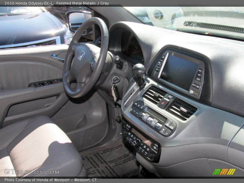 Polished Metal Metallic / Gray 2010 Honda Odyssey EX-L