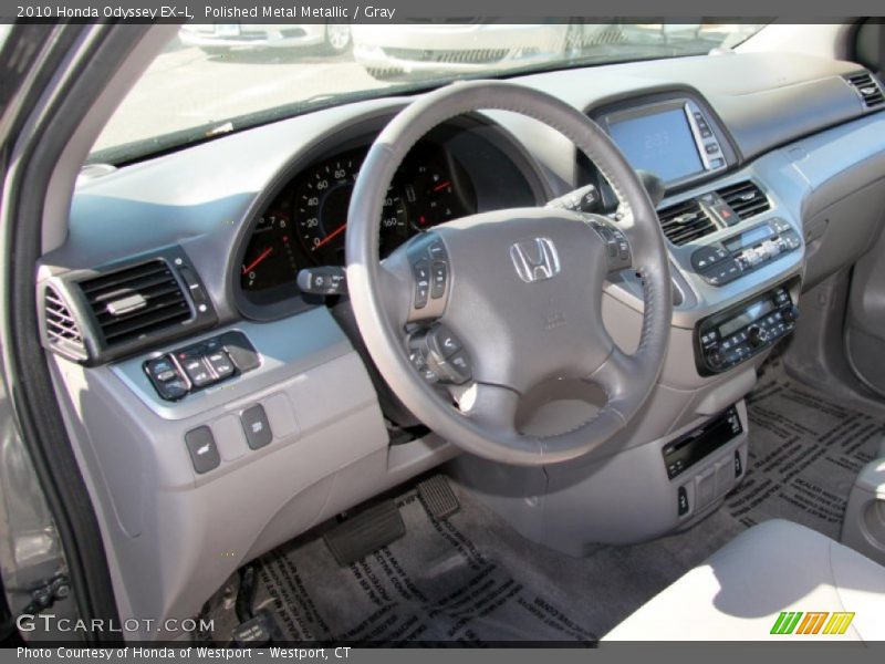 Polished Metal Metallic / Gray 2010 Honda Odyssey EX-L