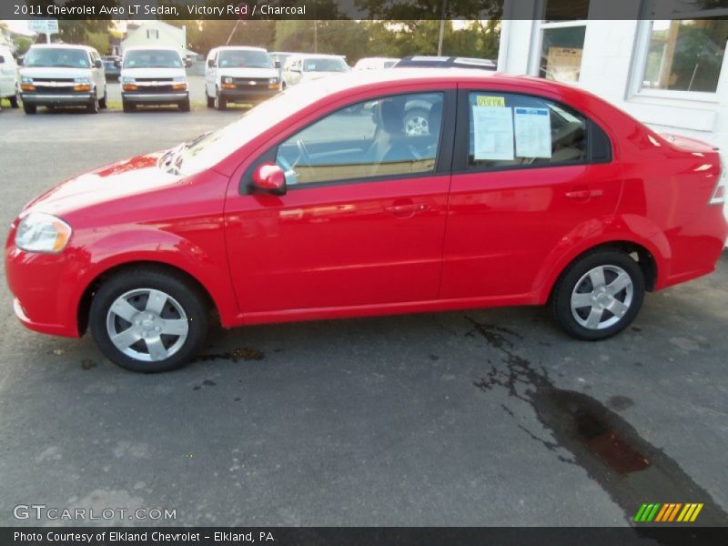 Victory Red / Charcoal 2011 Chevrolet Aveo LT Sedan