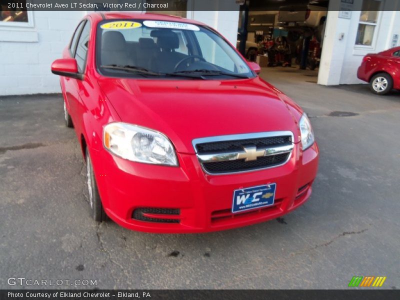 Victory Red / Charcoal 2011 Chevrolet Aveo LT Sedan