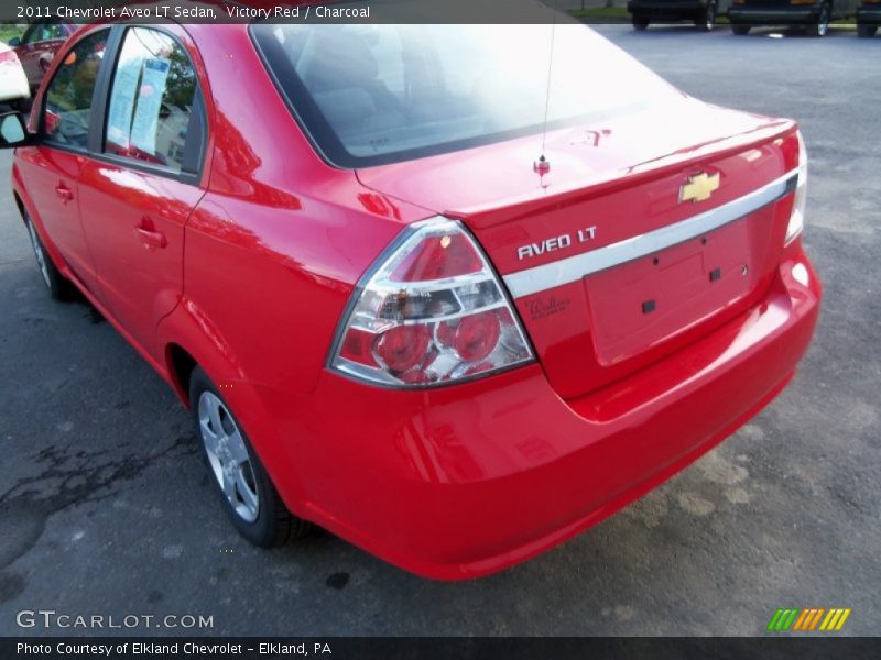 Victory Red / Charcoal 2011 Chevrolet Aveo LT Sedan