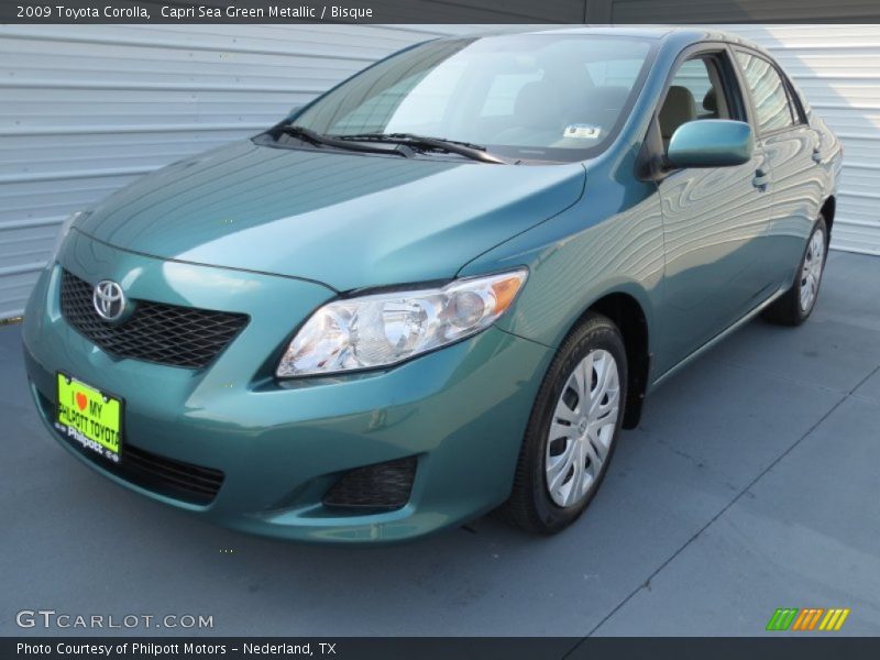 Capri Sea Green Metallic / Bisque 2009 Toyota Corolla