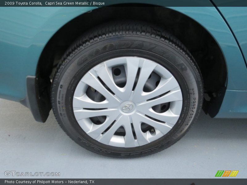 Capri Sea Green Metallic / Bisque 2009 Toyota Corolla
