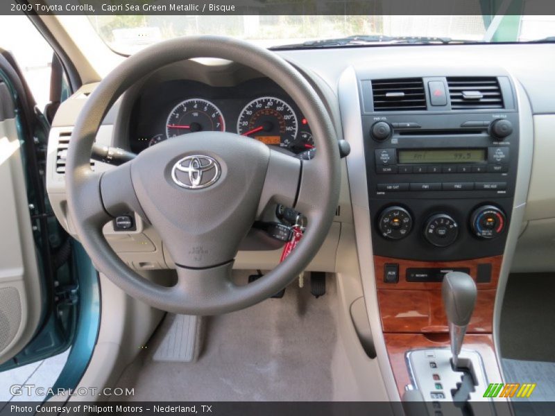 Capri Sea Green Metallic / Bisque 2009 Toyota Corolla