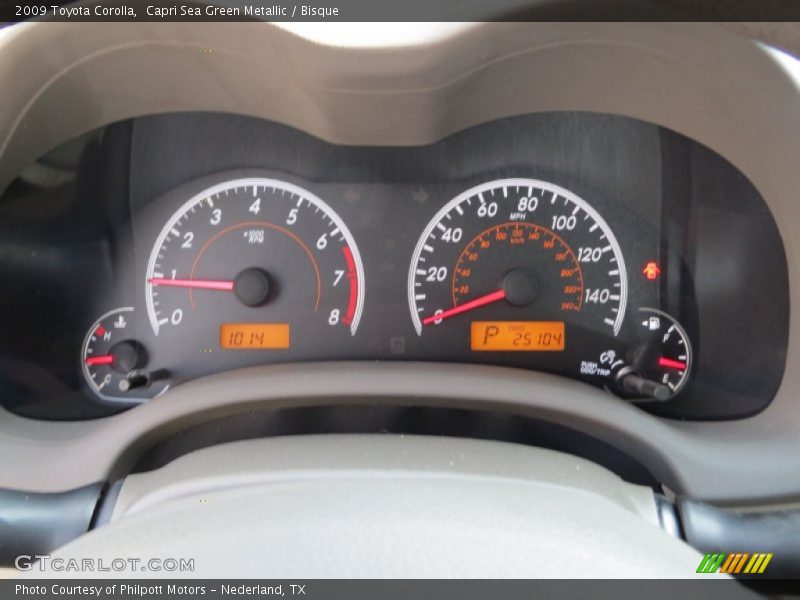 Capri Sea Green Metallic / Bisque 2009 Toyota Corolla