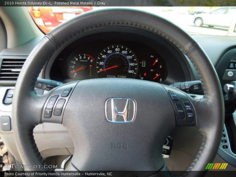 Polished Metal Metallic / Gray 2010 Honda Odyssey EX-L