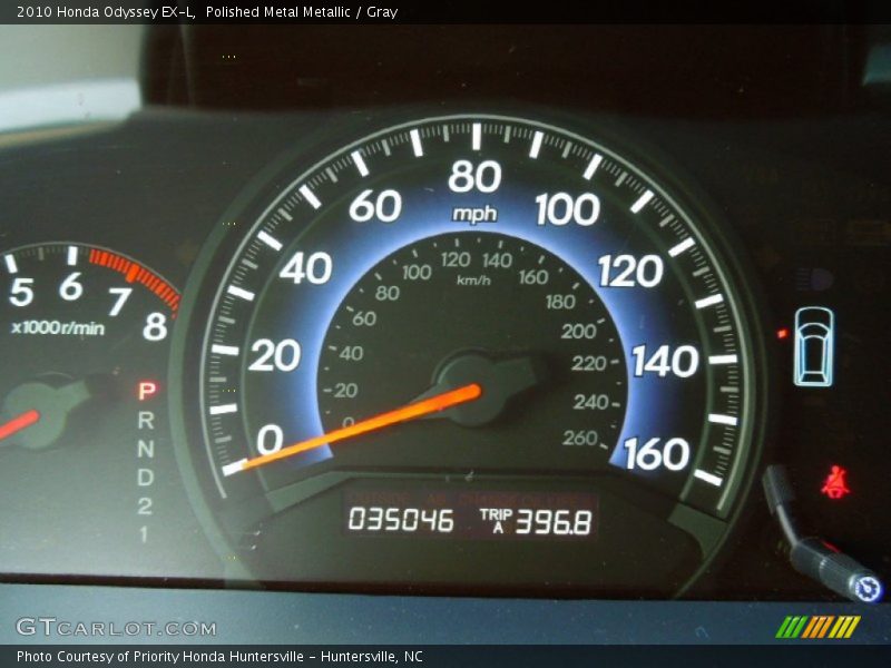 Polished Metal Metallic / Gray 2010 Honda Odyssey EX-L