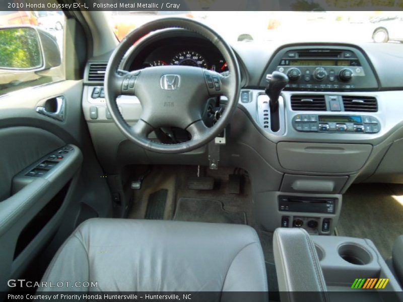 Polished Metal Metallic / Gray 2010 Honda Odyssey EX-L