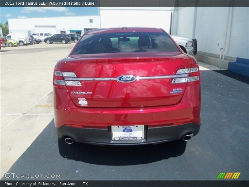 Ruby Red Metallic / Dune 2013 Ford Taurus SEL