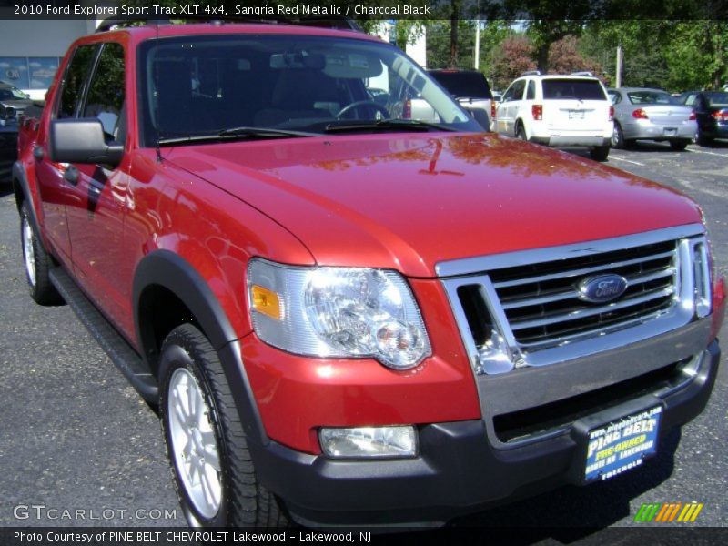 Sangria Red Metallic / Charcoal Black 2010 Ford Explorer Sport Trac XLT 4x4