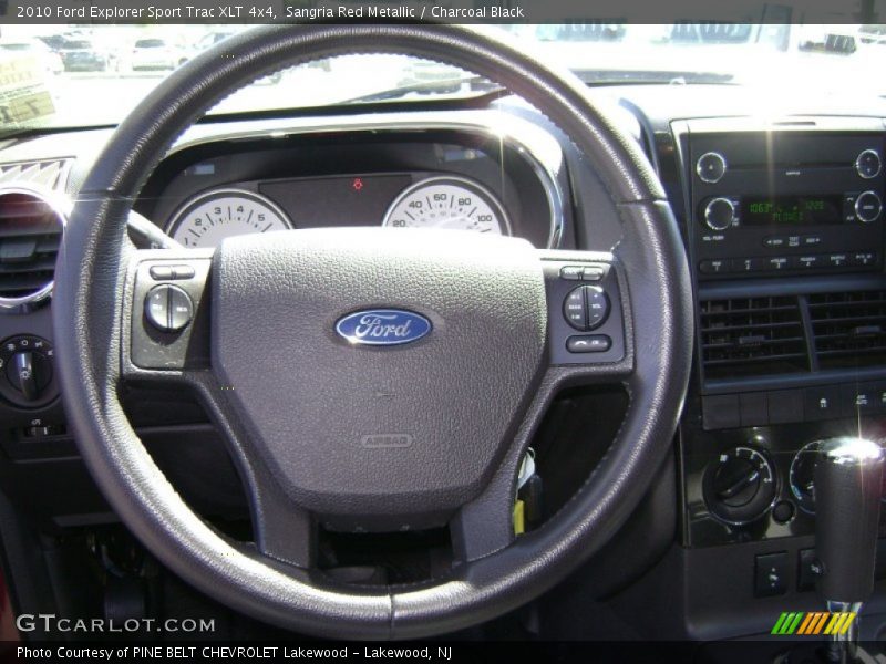 Sangria Red Metallic / Charcoal Black 2010 Ford Explorer Sport Trac XLT 4x4